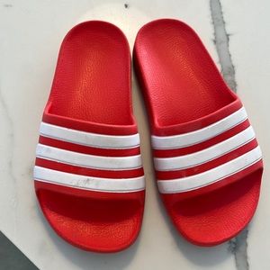Worn once adidas red boys sandals size is 12